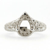 Sterling silver semi mount ring setting with intricate Art Deco design for 8x6mm pear cut gemstone.